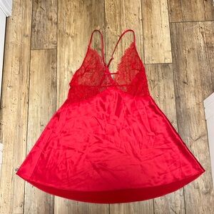 Like new condition, beautiful, red, silk and lace lingerie. Ladies large.